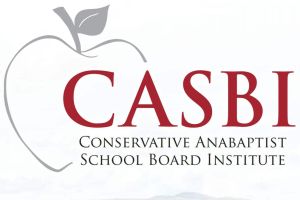 Thumbnail image of a hand extended in front of a person holding a bible and wearing a yellow shirt.